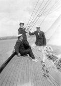 1422-Colonel Neill, Sir Thomas Lipton and the Queen of Spain aboard Shamrock. c1910.