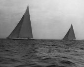 Ranger (left) and Yankee (right) during a America's cup trial race.  These types of races would occur during the months leading up to the America's Cup in order to determine who would be the defender of the Cup.  In 1937 Ranger became another in a long line of successful defenders. From the Edwin Levick Collection.