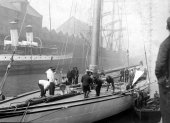 704-Rivetting on new chain plates and proceeding with the re-rigging at James Watt Docks, Greenock. Shamrock III. April 1903.